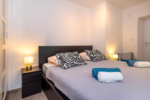 Postel nebo postele na pokoji v ubytování House STiKA