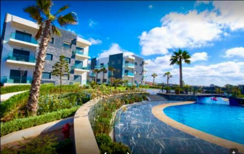 Πισίνα στο ή κοντά στο Appartement de 150 m2 en front de mer avec 6 piscines