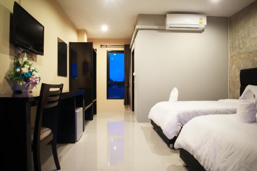 Fotografie z fotogalerie ubytování B-Cozy Hotel v destinaci Uttaradit