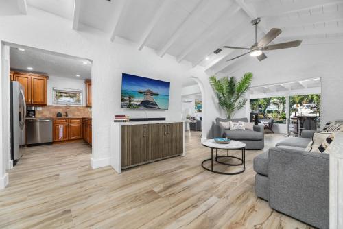 a living room with a couch and a table at The Riverside Retreat 2 in Fort Lauderdale