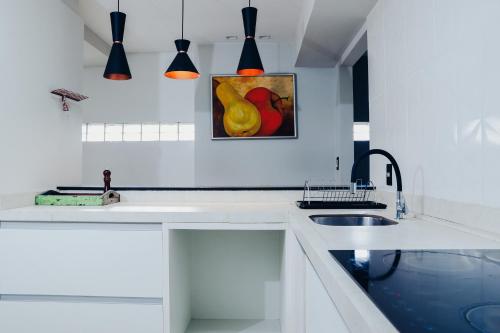 Dapur atau dapur kecil di Urbanature FIlme & Arte - Hotel Balneário Camboriú SC