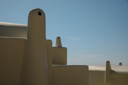 a close up of a building with the sky in the background at Zatrikion Santorini Villas in Pirgos