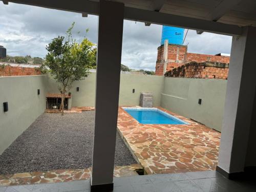 Bazén v ubytování Casa S&G grande con 3 habitaciones, 8 personas, piscina privada, cochera, aire acondicionado, TV, wifi, excelente ubicacion nebo v jeho okolí