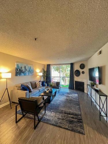 a living room with a couch and a table at Exceptional 2 BR in Heart of Hollywood 201 in Los Angeles