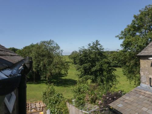 a view of a field from a house at Willow Cottage in Carnforth