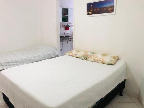 Ένα ή περισσότερα κρεβάτια σε δωμάτιο στο Lindo flat no recreio dos bandeirantes(gilka machado)