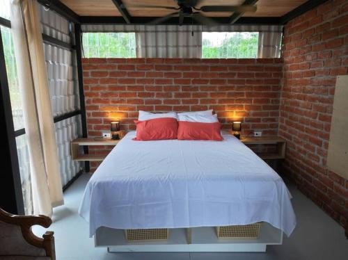 Postel nebo postele na pokoji v ubytování Casa Sol del Oriente - Emilio