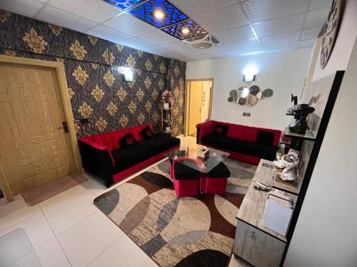 Χώρος καθιστικού στο AQZ Apartments Three Bedroom