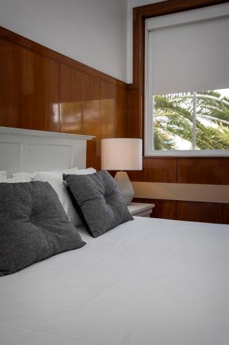 CH Boutique Hotel & Apartments, an Ascend Collection Hotelにあるベッド
