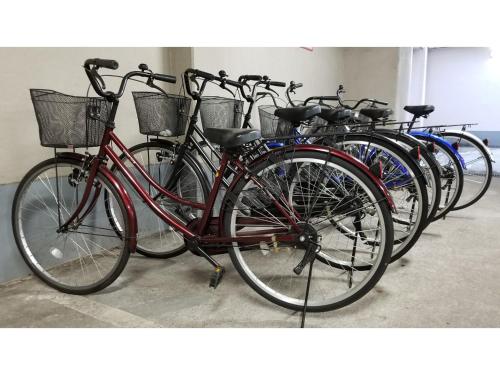 a row of bikes parked next to each other at Sun Royal Utsunomiya - Vacation STAY 02522v in Utsunomiya