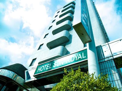 a building with a street sign in front of it at Sun Royal Utsunomiya - Vacation STAY 02507v in Utsunomiya