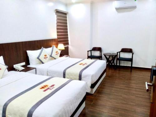 Ngọc Sơn Hotelにあるベッド