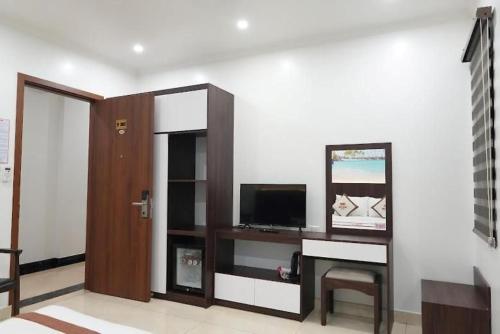 Ngọc Sơn Hotelにあるテレビまたはエンターテインメントセンター