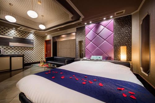 Postel nebo postele na pokoji v ubytování HOTEL MOBILIA (Adult Only)