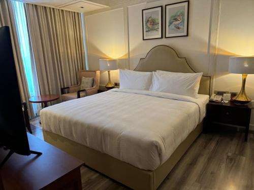 Ein Bett oder Betten in einem Zimmer der Unterkunft Hotel Greenberry Narkanda