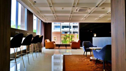 Grand Mercure Bangkok Asoke Residenceにあるシーティングエリア