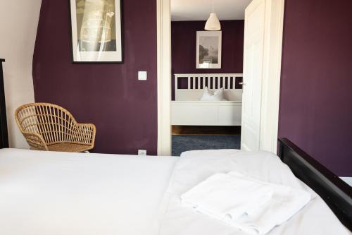 Ένα ή περισσότερα κρεβάτια σε δωμάτιο στο Old Town Center Apartments