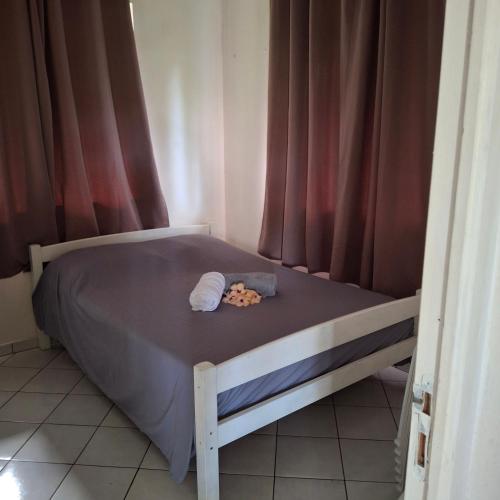 Postel nebo postele na pokoji v ubytování AnapaHere Lodge