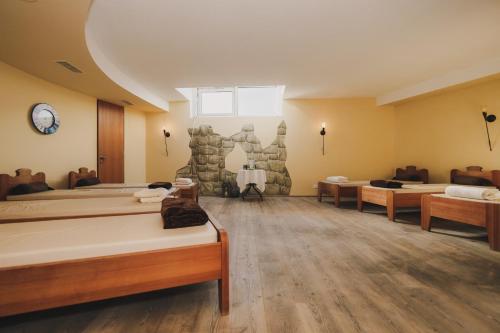 Voodi või voodid majutusasutuse Saldur Small Active Hotel toas