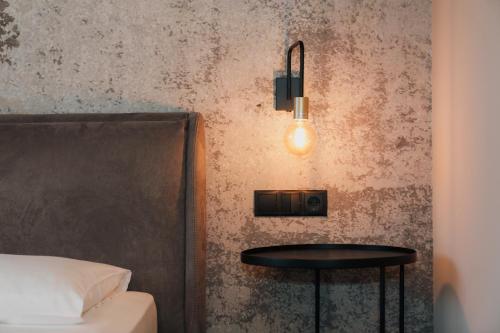 Postel nebo postele na pokoji v ubytování Saldur Small Active Hotel
