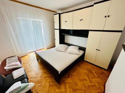 Posteľ alebo postele v izbe v ubytovaní Apartments Baraba