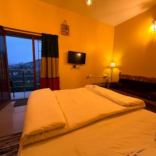 Rastafari - The Backpackers Hostelにあるベッド