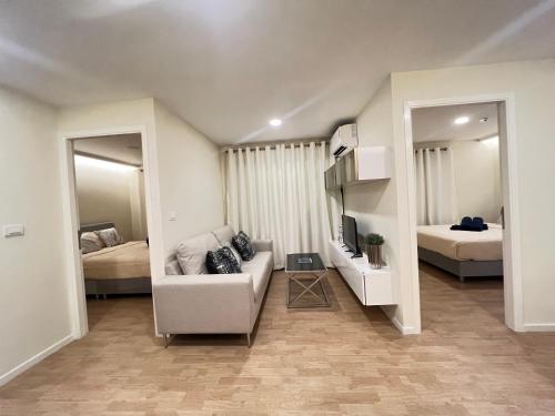 Postel nebo postele na pokoji v ubytování The Forest Building A-more than3nights stay-self checkin checkout