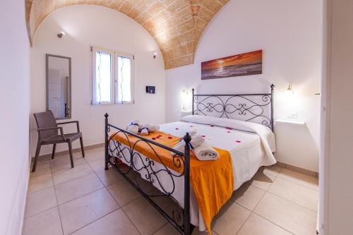 Ένα ή περισσότερα κρεβάτια σε δωμάτιο στο SOFFIO DI MARE Appartamento Levante