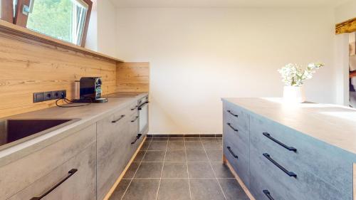a kitchen with a sink and a counter top at Haus Moritz in Oetz