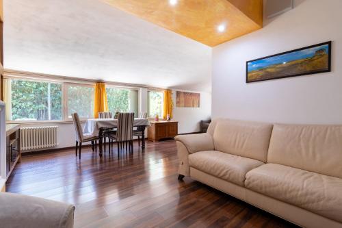 a living room with a couch and a table at Villa Lorenz in Putignano