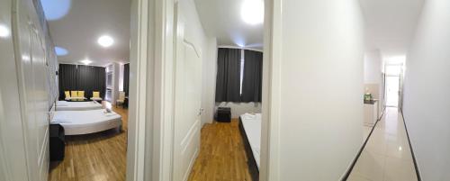 Postel nebo postele na pokoji v ubytování Apartments Philip II