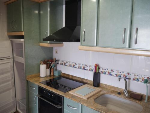 Η κουζίνα ή μικρή κουζίνα στο Malvarrosa, 1-6