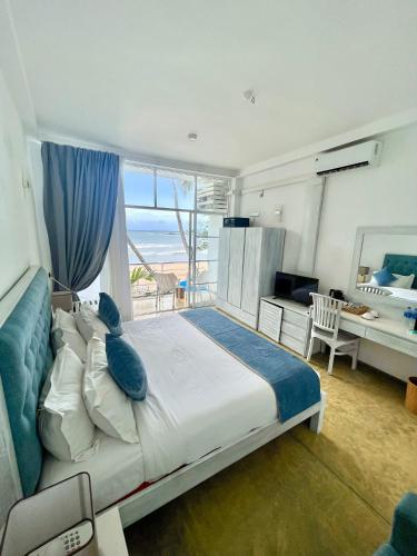 Katil atau katil-katil dalam bilik di Smeralda Resorts Dikwella