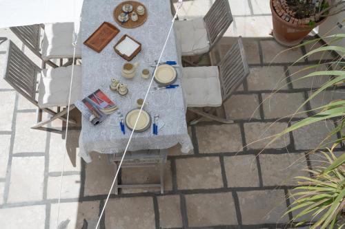 an overhead view of a table on a patio at Riva Mediterranea in Otranto