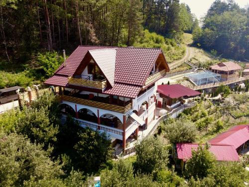 an aerial view of a house with a train station at Vila Victoria in Pangarati