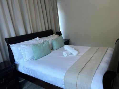 Calla Lily Guesthouseにあるベッド