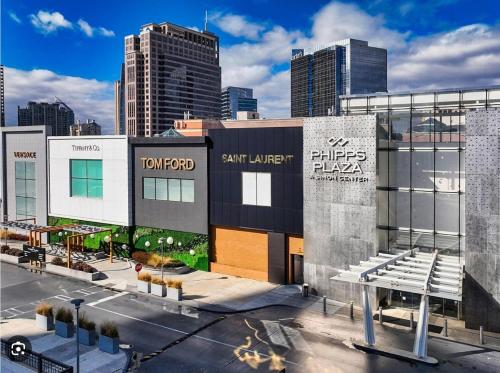 a building with a sign on it in a city at M1 - Private and serene 1bdr 1ba ensuite shared room in Atlanta