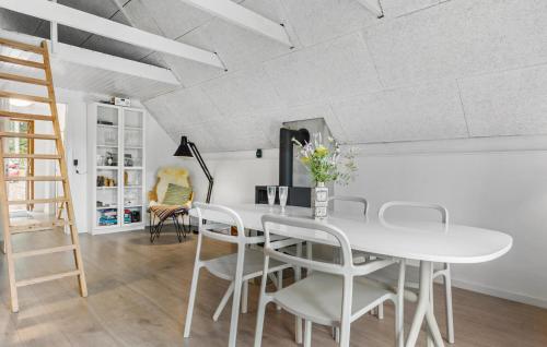 a white dining room with a white table and chairs at Awesome Home In Toftlund With Wifi in Toftlund