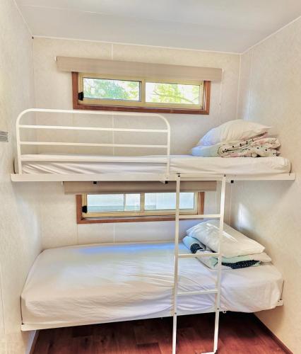 Letto o letti in una camera di Kanasta Caravan Park
