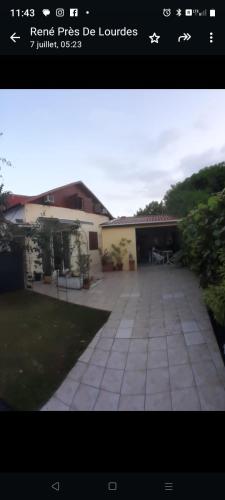 a screenshot of a house with a picture of a driveway at Sunbeachparadise in Port-Louis