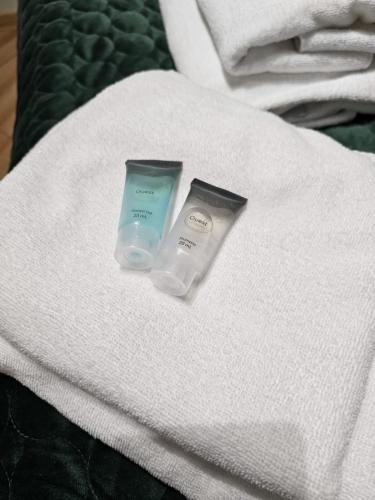 a couple of products sitting on top of a bed at Smile Apart in Biały Dunajec