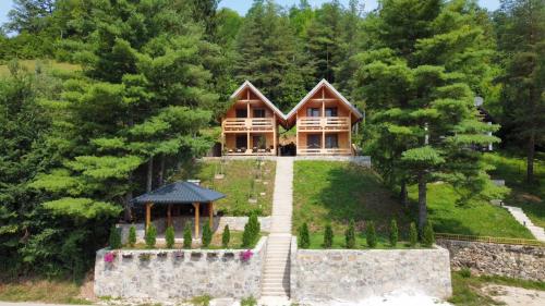 an aerial view of a home with a stone wall at LAna in Šipovo