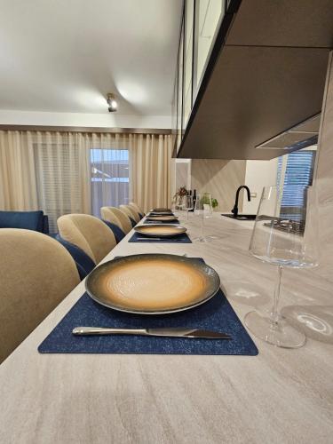 a table with a large plate on top of it at Luxury Apartment Ane in Zadar