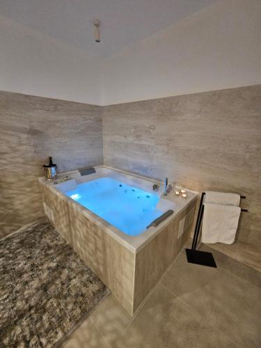 a large bath tub in a room with at Luxury Apartment Ane in Zadar