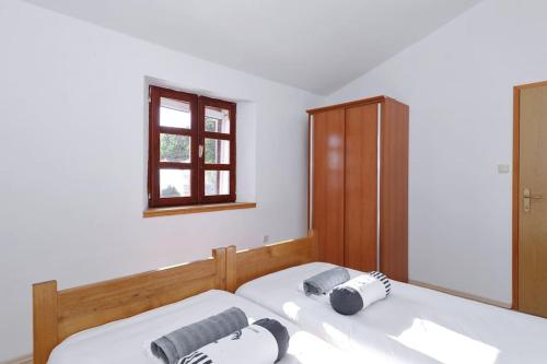 Postel nebo postele na pokoji v ubytování Kuća za odmor Island just for You - Ravna Sika
