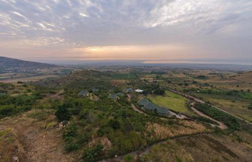 an aerial view of a small village on a hill at Lake George View Golf Resort in Kahendero