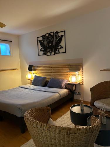 Ένα ή περισσότερα κρεβάτια σε δωμάτιο στο Chambre d'Hôtes de charme