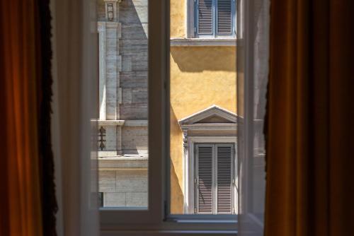 a view from a window of a building at The Couper Umiltà in Rome