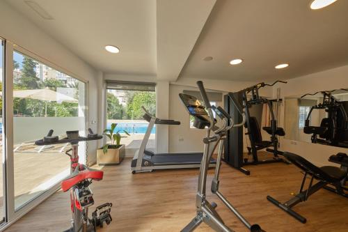 a gym with tread machines and a treadmill at Hotel Joan Miró Museum in Palma de Mallorca