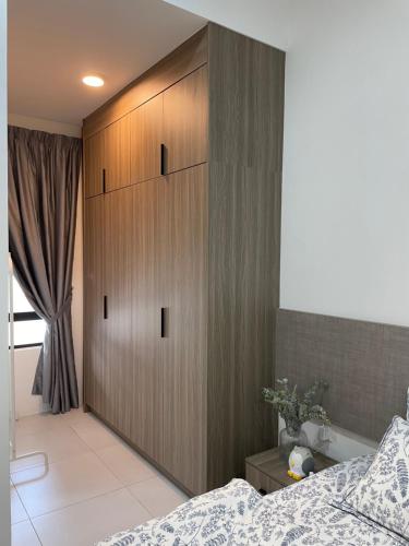 Кровать или кровати в номере The Imans Place